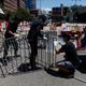 Protesters use barricades to block the road at the Cross Harbour Tunnel in Hong Kong, Aug. 5, 2019.